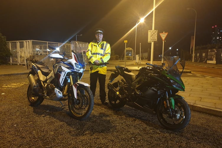 Sergeant Craig Winstanley of Merseyside police with the recovered motorcycles