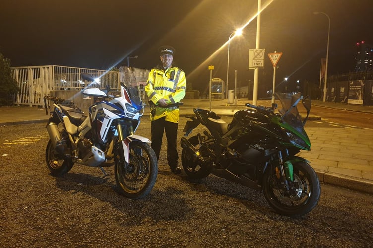 Sergeant Craig Winstanley of Merseyside police with the recovered motorcycles