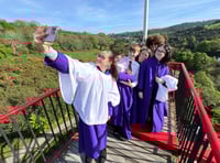 Video shows choir singing at the top of iconic Laxey Wheel