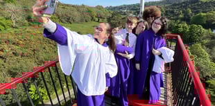 Video shows choir singing at the top of iconic Laxey Wheel