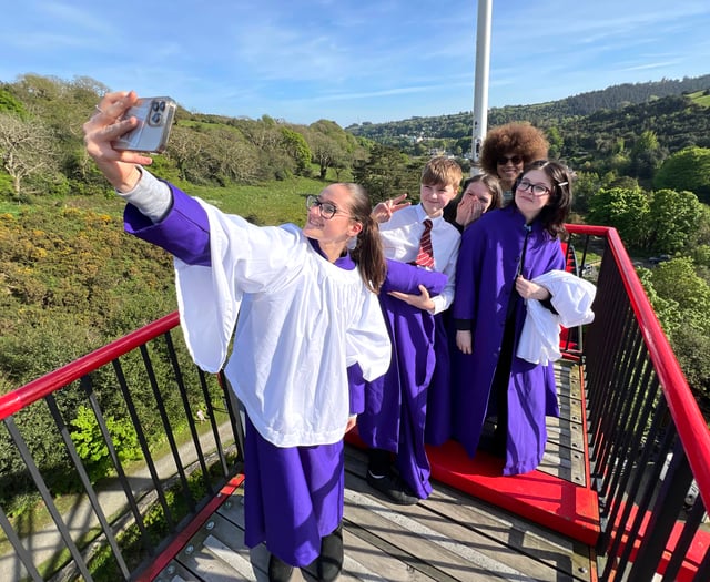 Video shows choir singing at the top of iconic Laxey Wheel