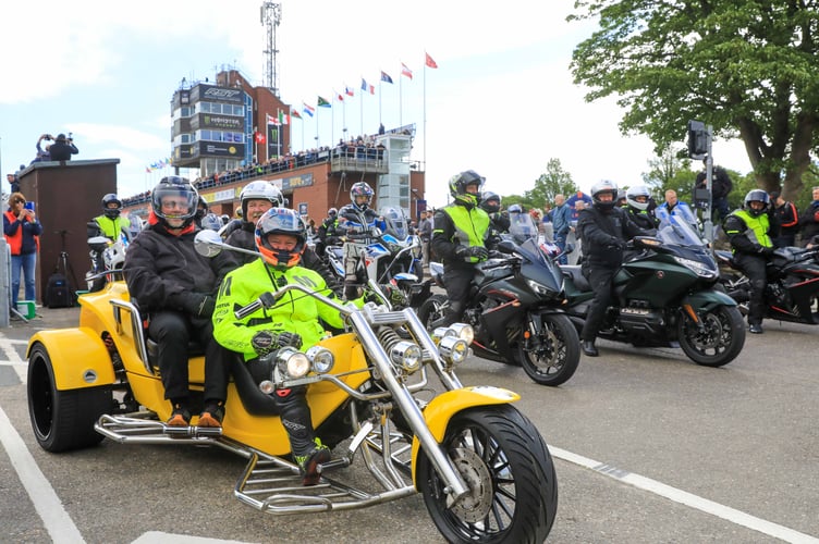 Travelling Marshal Jim Hunter, Reverend John Coldwell and Paul Turton during the Isle of Man TT Races Legacy Lap 2024