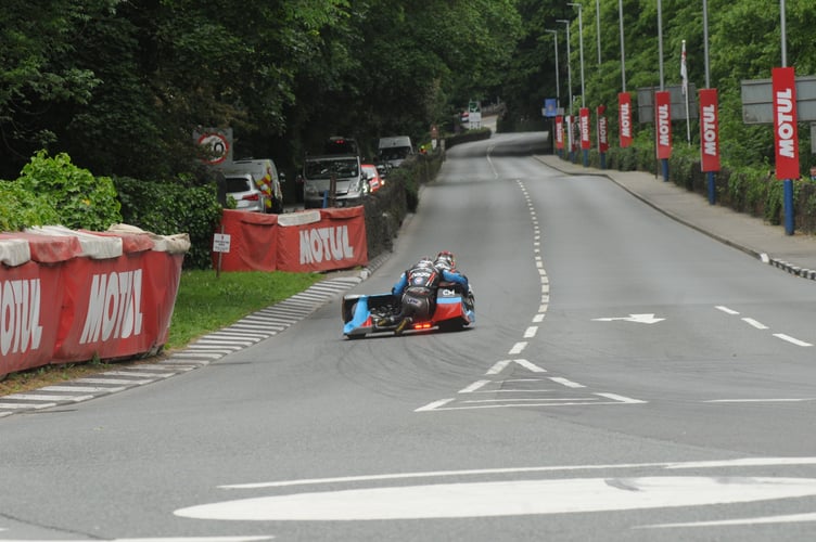 A sidecar exiting Quarterbridge towards Braddan Bridge