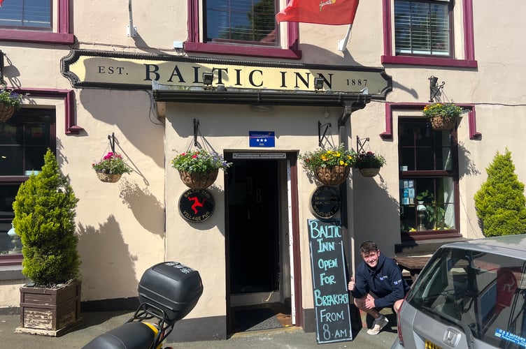 Tom outside the Baltic Inn