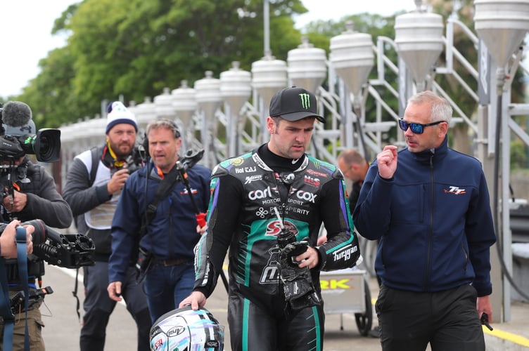 TT business development manager Paul Phillips (right) with Michael Dunlop