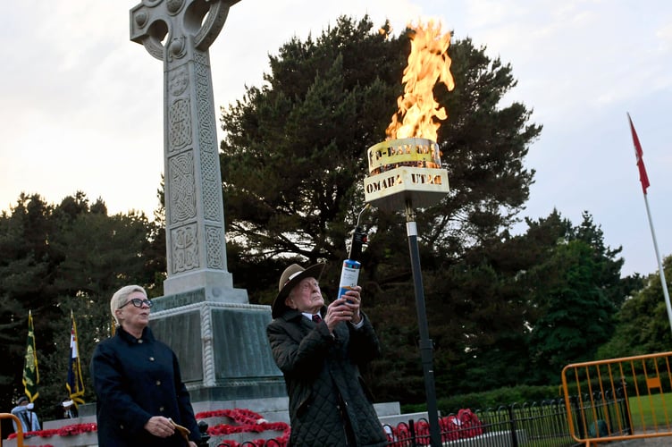 The beacon was lit by Second World War veteran James Fenton