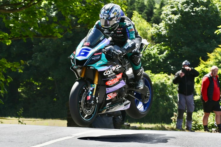 Michael Dunlop leads the Supersport Race Two