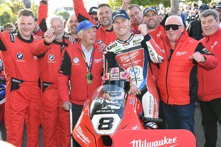 Davey Todd celebrates his Senior TT victory on Saturday evening
