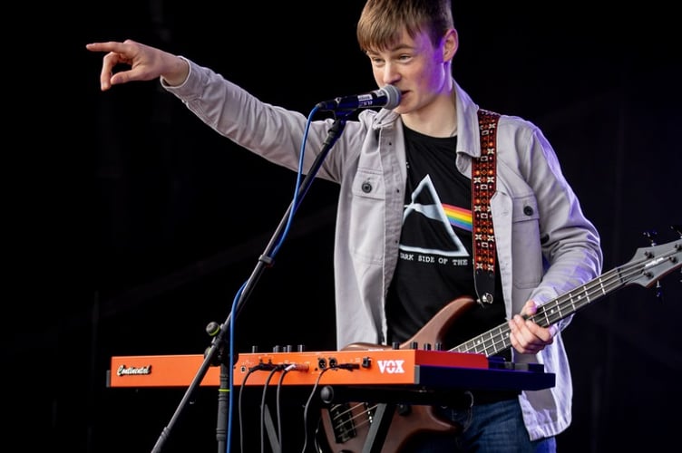 Crawlboard lift up the crowd during a wet Bushy's TT Village 2024