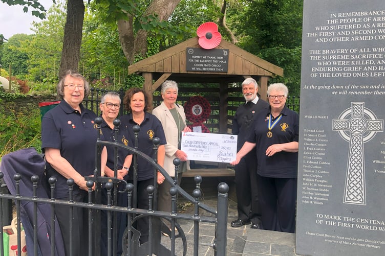 (Left to right) Pauline Falch, Carole Williams and Sandra West, of the Royal British Legion with Adrienne Sanderson and Brian Matthews, of Rushen Players and Jan Rae, chairman of Royal British Legion Colby, receiving the cheque