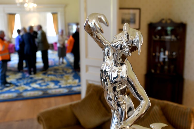 One of the two TT trophies on display at Government House on Thursday