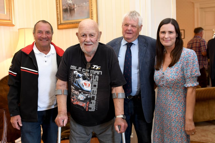Visitor Graeme Crate (front) has been to the past 46 Isle of Man TTs, and wears a TT t-shirt every day. 
