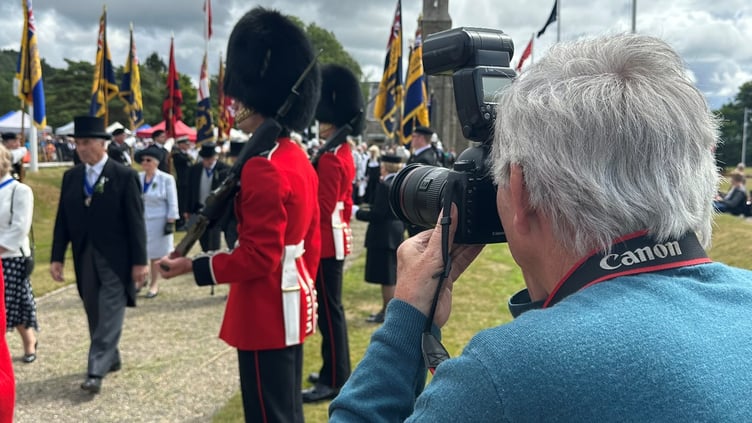 Martin Parr taking photos at Tynwald Day last year
