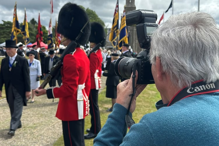 Martin Parr taking photos at Tynwald Day last year