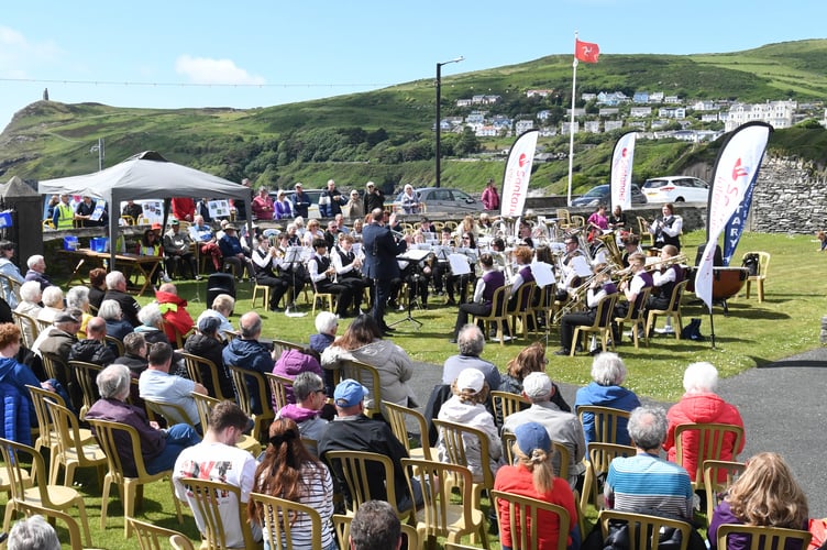 Manx Concert Brass playing at the 2024 Port Erin Brass Band Festival in the shadow of Bradda Head