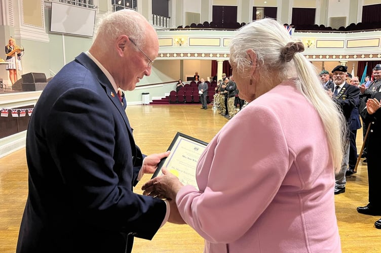 Sir John Lorimer presenting the Governor's award to Ann Wilson