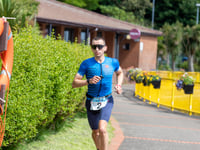 Isaac and Halsall clinch middle distance tri honours