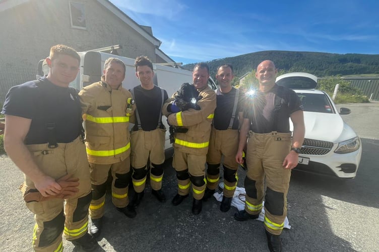 Isle of Man Fire Service Green Watch crew who rescued cocker spaniel Suki who got stuck under a van seat