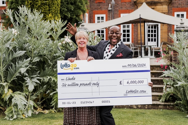 Lottogo.com have paid out £6m to Linda from Surrey, pictured with TV chef Ainsley Harriott