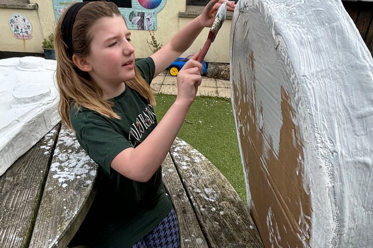 Dhoon school pupils creating some of the art work