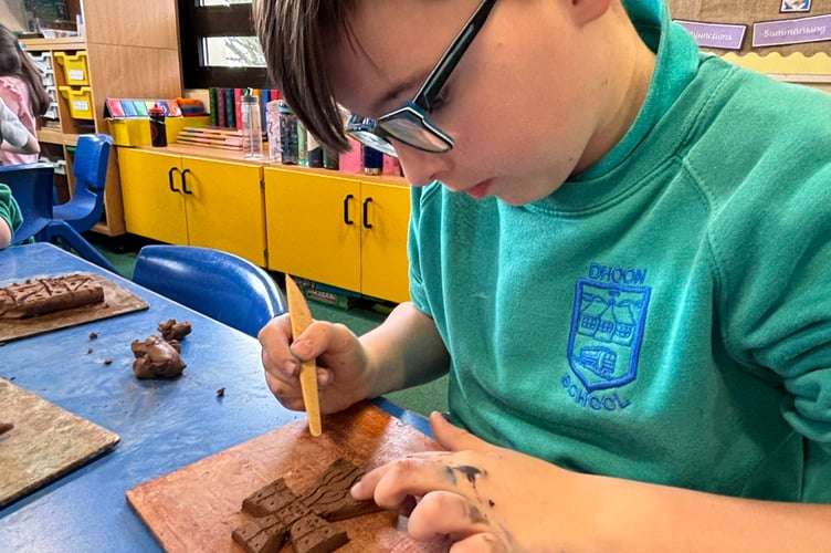 Dhoon school pupils creating some of the art work