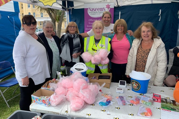 Mayor Natalie Byron-Teare with some of the volunteers on the Naseem's Manx Brain Tumour Charity stall