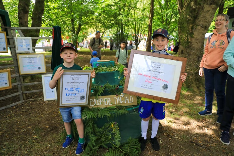 Arthur and James with their Biosphere awards at the Global Village