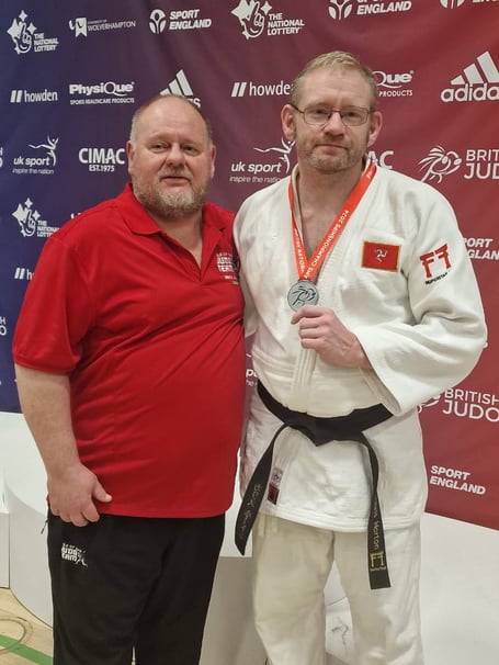 Isle of Man judoka Chris Horton (right) pictured with his silver medal at the British Masters Championships last weekend