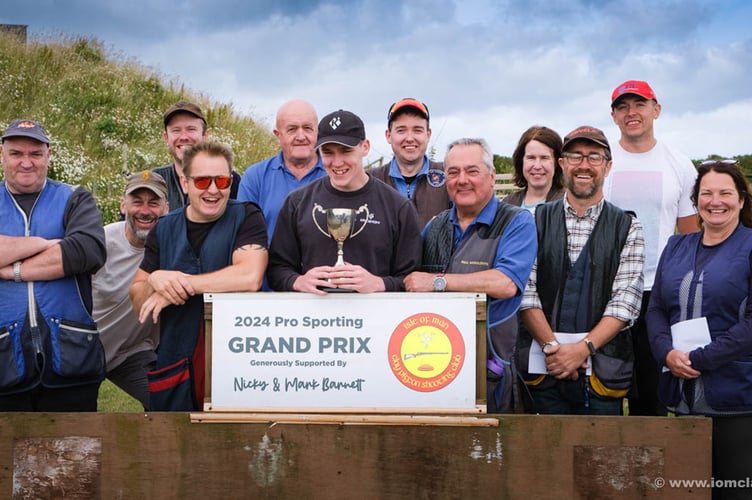 Prizewinners in Isle of Man Clay Pigeon Shooting Club’s annual Pro Sporting Grand Prix, including overall winner Michael Cross with the trophy
