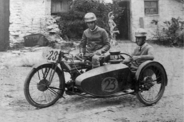 Winners of the 1925 sidecar TT race: Len Parker of Oldfield Park, Bath and passenger K.J. Horstman of Newbridge Hill, with the Mercury trophy awarded by the ACU