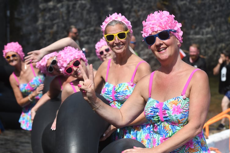 The 51st edition of the World Tin Bath Championship in Castletown harbour - the 'Synchronised Sinkers' in snake race two