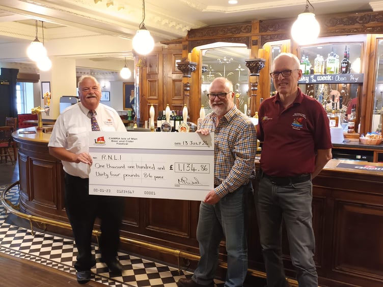 RNLI's Martyn Perkins (left) with CAMRA Isle of Man Beer and Cider Festival organisers Matt Cox and Mike Ward (right)