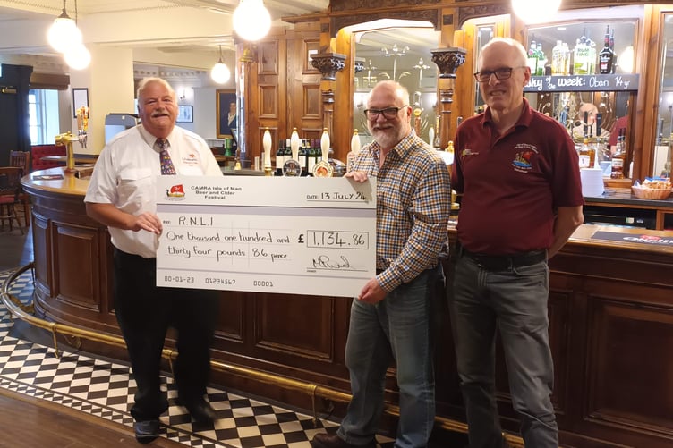 RNLI's Martyn Perkins (left) with CAMRA Isle of Man Beer and Cider Festival organisers Matt Cox and Mike Ward (right)
