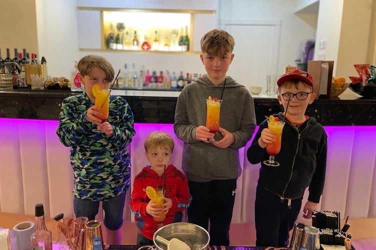 Children enjoying mocktail making at the Comis, available in the Summer Adventureland package 
