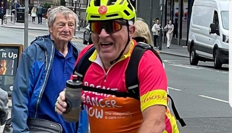 Gordon with his Breast Cancer Now t-shirt on display