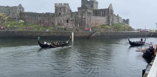 Video shows competitors brave the weather at Viking Longboat Day