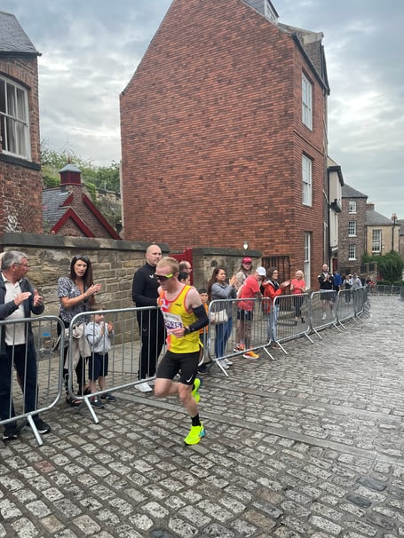 Corrin Leeming on his way to victory on the cobbles of Durham