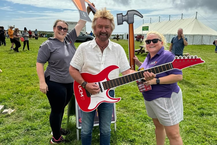 Noel Edmunds with University College Isle of Man staff at the Southern Agricultural Show