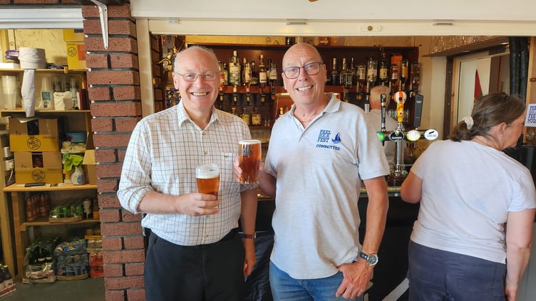 Lieutenant Governor Sir John Lorimer enjoys an Odin Jolly Roger pint with Roger Cave