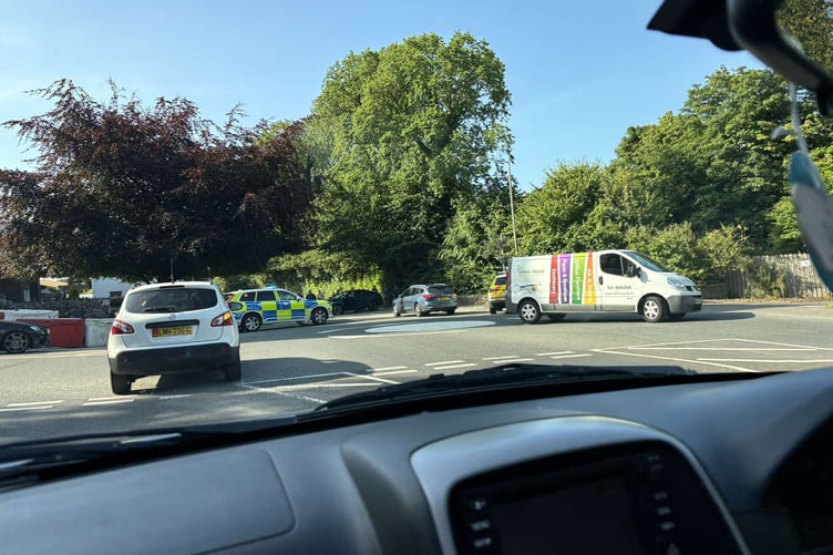 Emergency services at the scene of the crash near Braddan Church