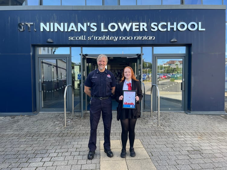 Stevee from St Ninian's High School with her winning poster