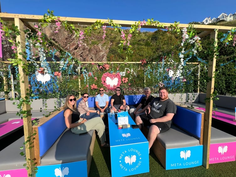 Attendees enjoying a drink at the new pop-up bar!