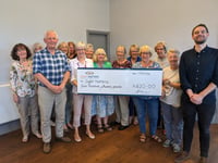 Mannin Quilters donate to charity Sight Matters's solar panel project 