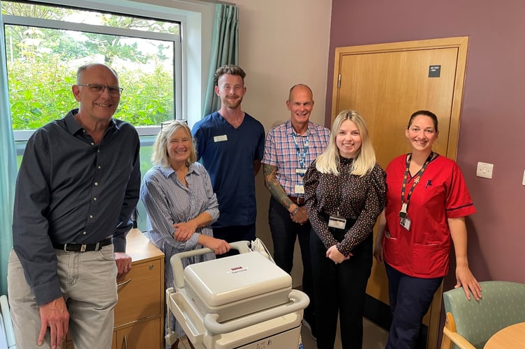 (Left to right) Richard Akitt and Karen Chiarello from the Manx Heart Foundation, Gavin Turnbull (service lead/clinical practitioner, AATU), Mark Cox (general manager for medicine, urgent and emergency care and ambulance service), Georgia Wild (lead business manager for medicine, urgent and emergency care and ambulance service), and Jo Standish (associate director of nursing for medicine, urgent and emergency care and ambulance service)