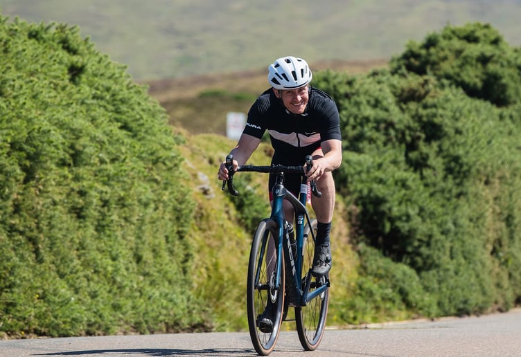 Dean Harrison on the climb towards Round Table in the recent Gran Fondo. He completed the course in 5hr 35min 45sec. He completes a six-lap race at the TT in less than 1hr 50min (Photo: Gran Fondo Isle of Man)