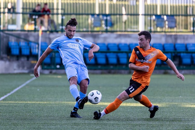 Rushen United's Joe Reid (left) and Ayre United's Harry Best went toe-to-toe in the Charity Shield two years ago. The two sides lock horns again in the same match next Friday at the Bowl (Photo: Gary Weightman)