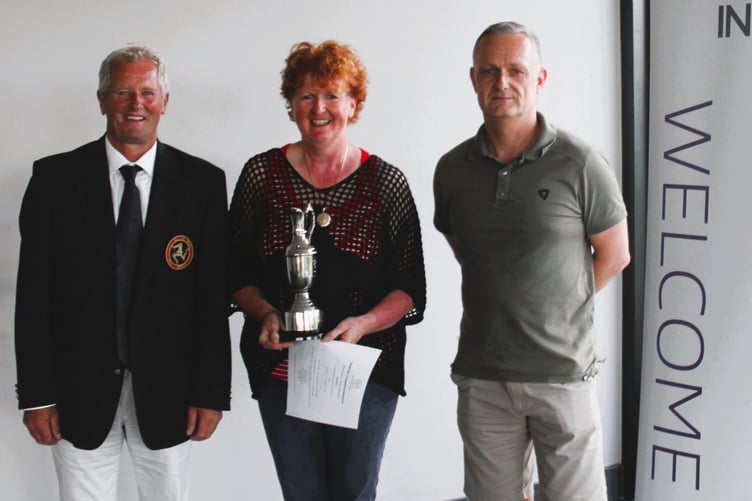 (Left to right) Isle of Man Golf president elect Gary Ashe, Di Neale and Richard Hulme of sponsor Tower Insurance