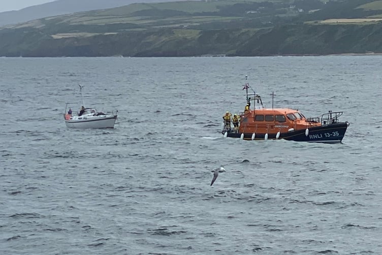 Peel lifeboat towing a yacht