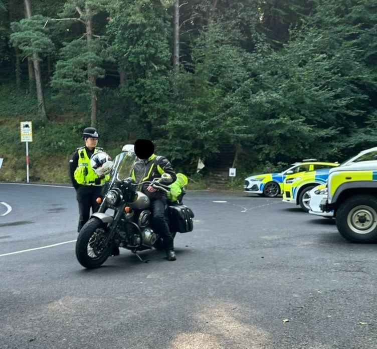 Police ticketing one biker near the Ramsey Hairpin this morning