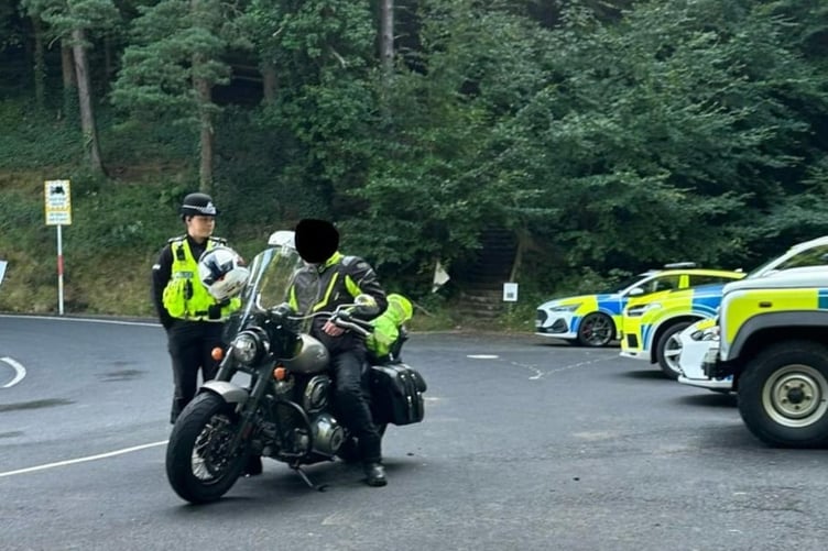 Police ticketing one biker near the Ramsey Hairpin this morning